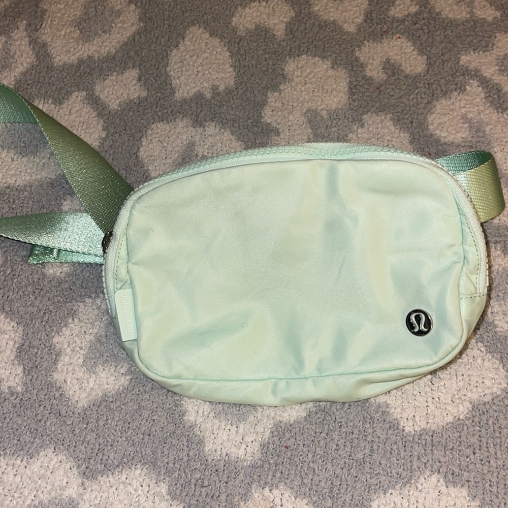 Mint green, Lululemon belt bag. Excellent condition all use a few times.